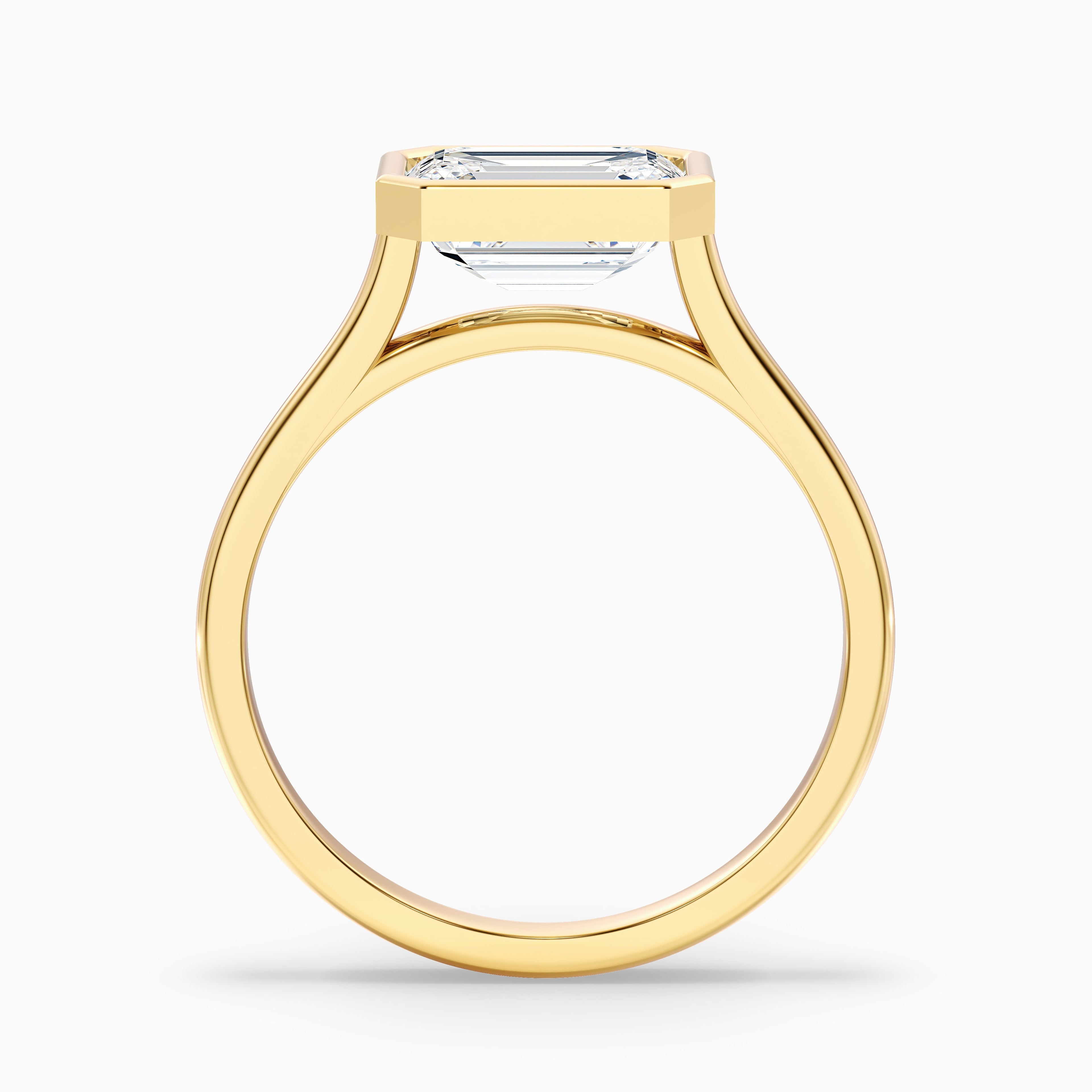 Kelsey 2 Carat Emerald East West Bezel Moissanite Diamond Ring In 18k Yellow Gold