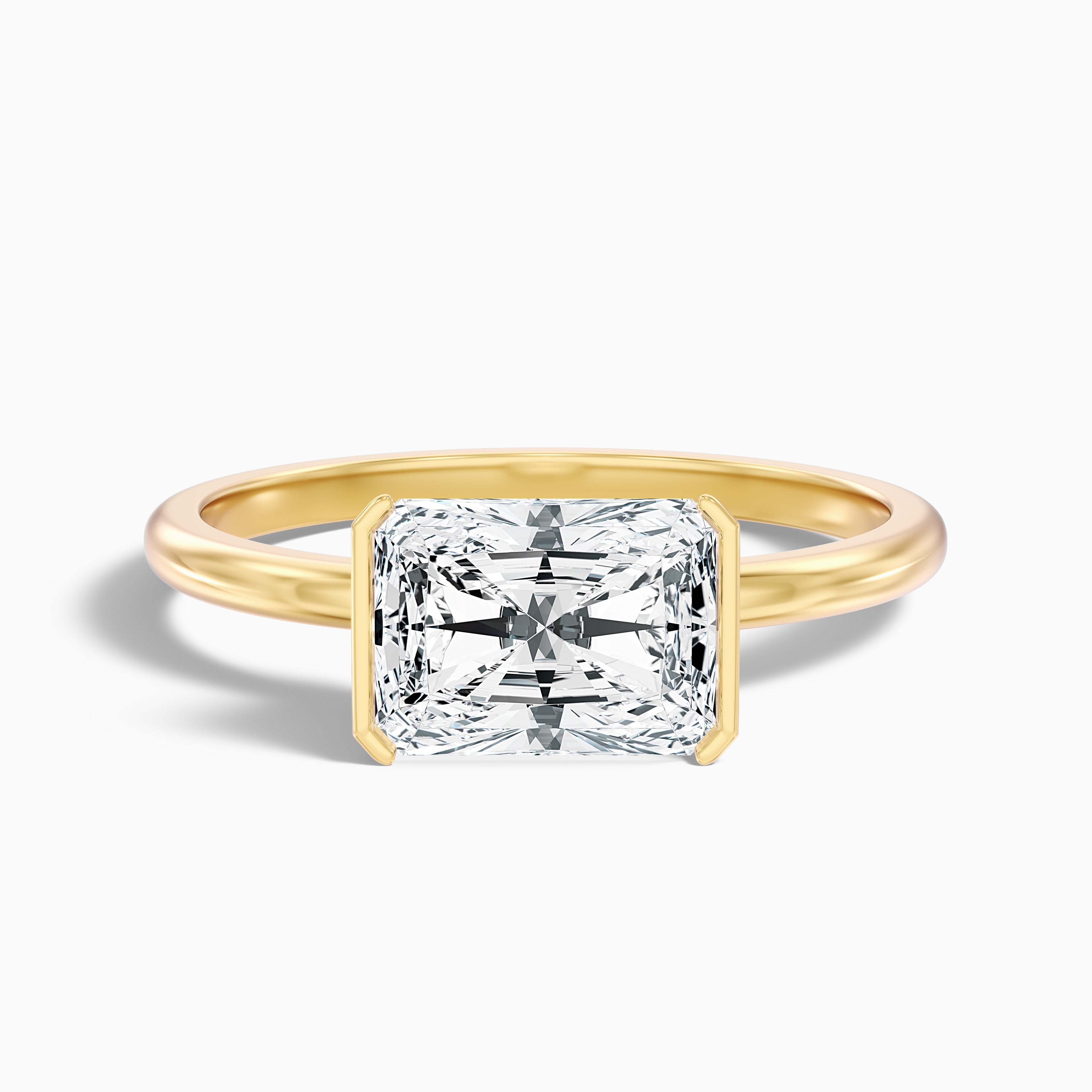Celia 1.5 Carat Radiant Cut East West Half Bezel Moissanite Diamond Ring in 18k Yellow Gold