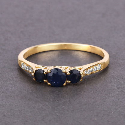 0.56 Carat Genuine Blue Sapphire and White Diamond 14K Yellow Gold Ring by Bids.com