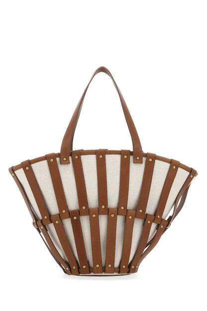 Saint Laurent Women Two-Tone Canvas And Leather Medium Beatrix Shopping Bag by Luosophy