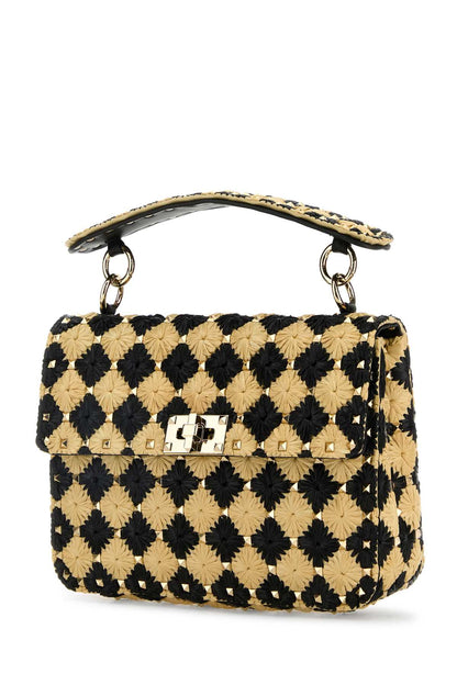 Valentino Garavani Women Two-Tone Raffia Medium Rockstud Spike Handbag by Luosophy