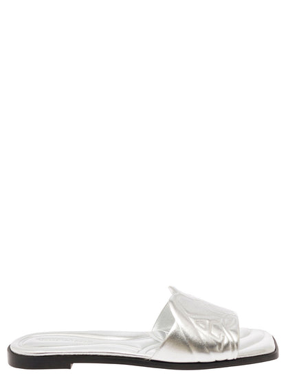 Alexander Mcqueen Women Metallic Flat Sandals With Embossed Motif In Metallic Leather Woman by Luosophy