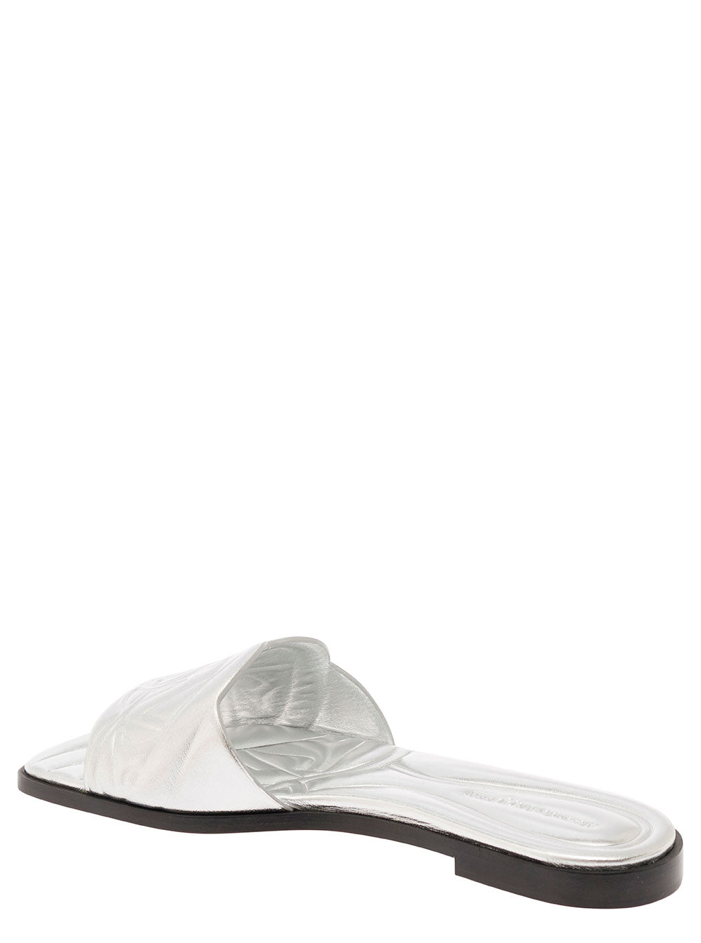 Alexander Mcqueen Women Metallic Flat Sandals With Embossed Motif In Metallic Leather Woman by Luosophy