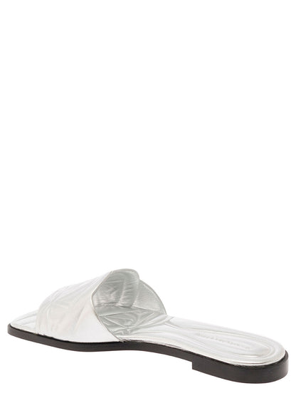 Alexander Mcqueen Women Metallic Flat Sandals With Embossed Motif In Metallic Leather Woman by Luosophy