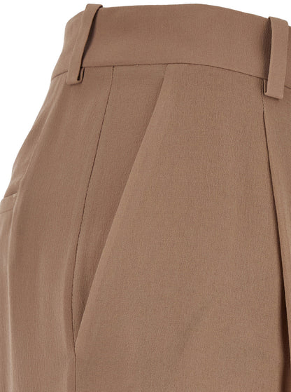 Saint Laurent Women Beige Pants With High Waist And Pences On The Front In Silk Woman by Luosophy
