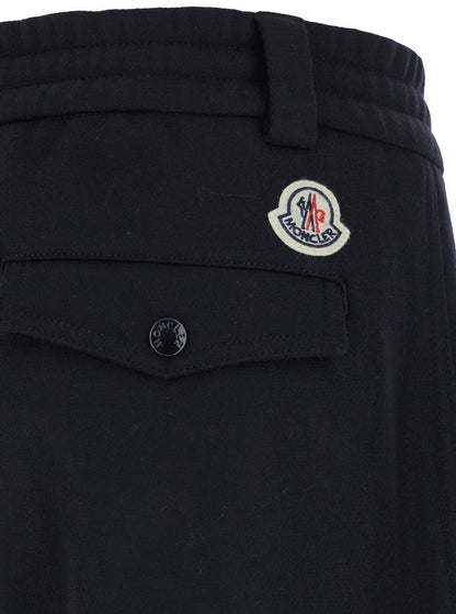 Moncler Men Blue Pants With Drawstring Elastic Waist And Logo Patch On The Rear In Wool Man by Luosophy