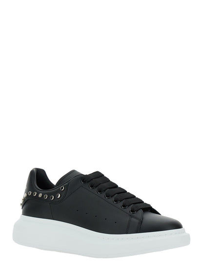Alexander Mcqueen Men Black Low Top Sneakers With Stud Embellishments In Leather Man by Luosophy