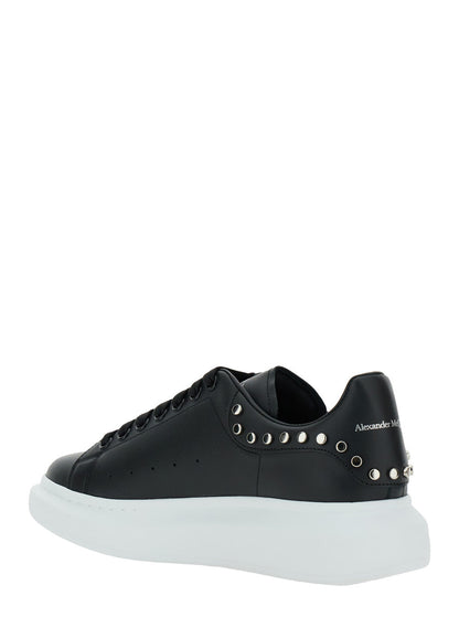 Alexander Mcqueen Men Black Low Top Sneakers With Stud Embellishments In Leather Man by Luosophy