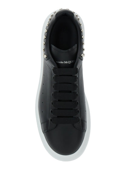 Alexander Mcqueen Men Black Low Top Sneakers With Stud Embellishments In Leather Man by Luosophy