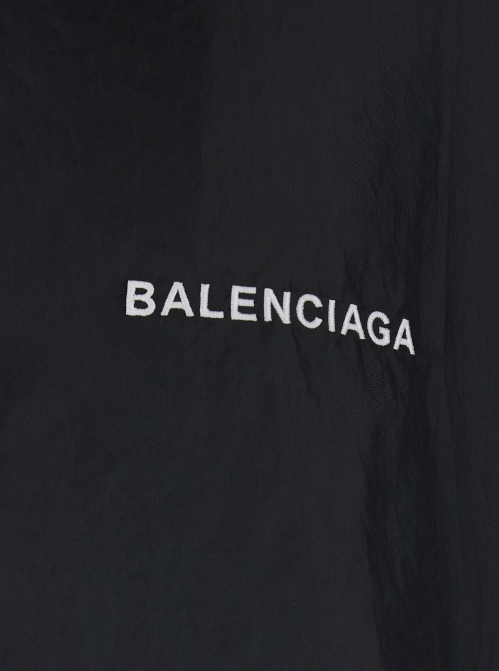 Balenciaga Men Black Jacket With Logo Lettering On The Front And Logo Patch On The Elbow In Tech Fabric Man by Luosophy