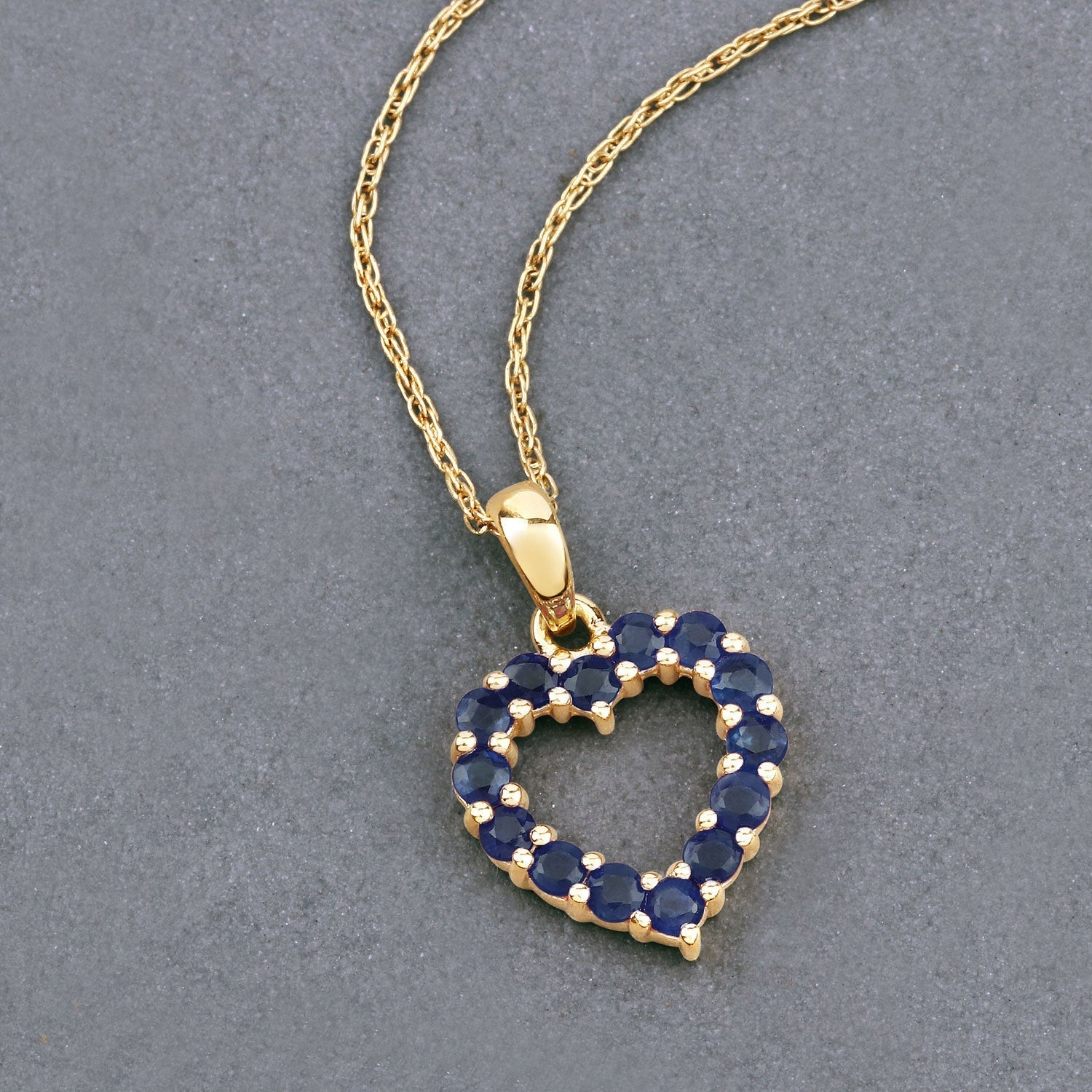 0.64 Carat Genuine Blue Sapphire 10K Yellow Gold  Pendant  DestGlow