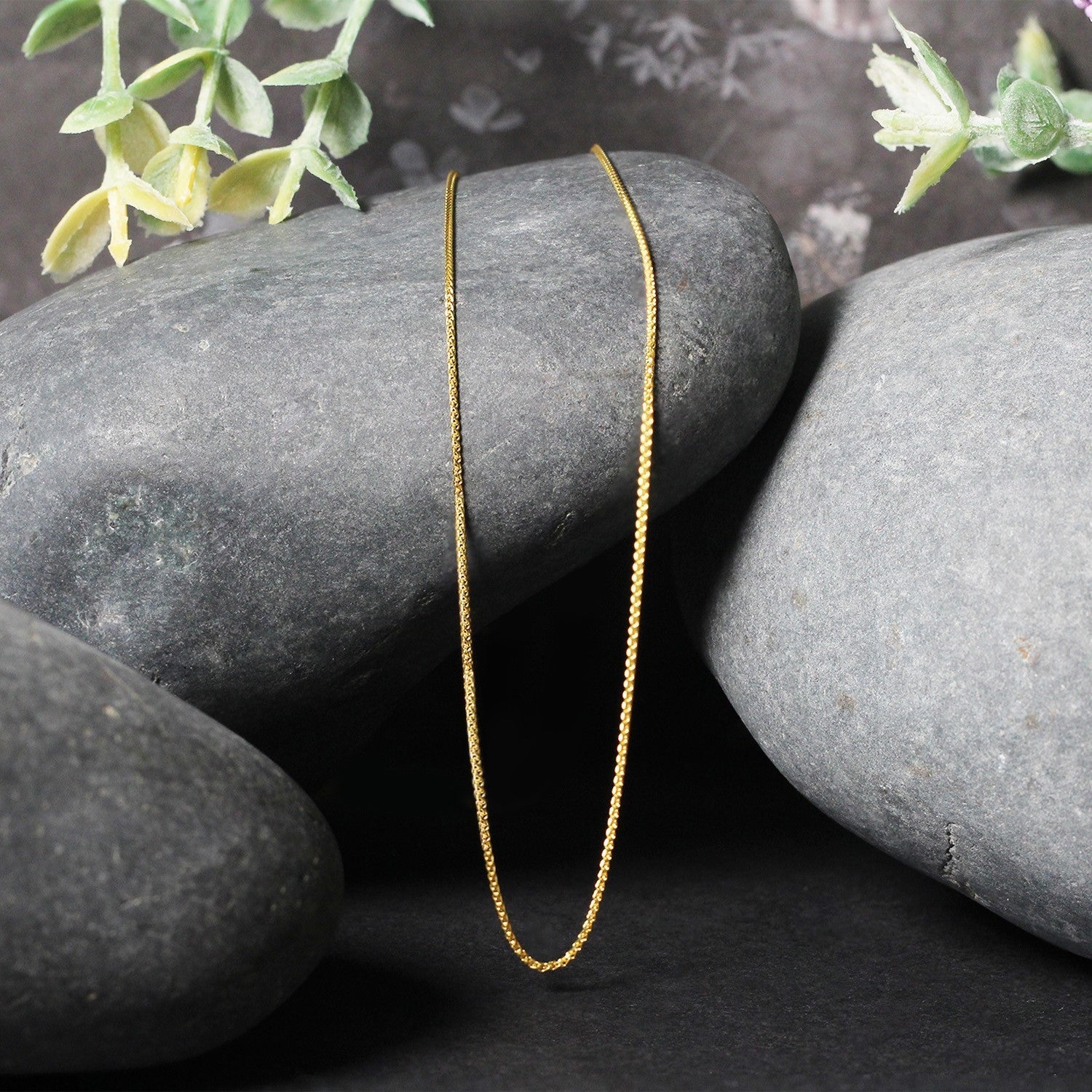 14k Yellow Gold Diamond Cut Round Wheat Chain 0.6mm by Bids.com