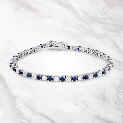 6.87 ct. t.w. Blue Sapphire and White Topaz Bracelet in Sterling Silver by Bids.com