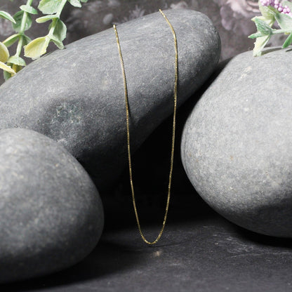 14k Yellow Gold Classic Box Chain 0.6mm by Bids.com