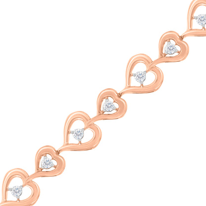 Rose Plated Sterling Silver Diamond Heart-Linked Bolo Bracelet (0.30 cttw, H-I Color, I2-I3 Clarity) by Bids.com