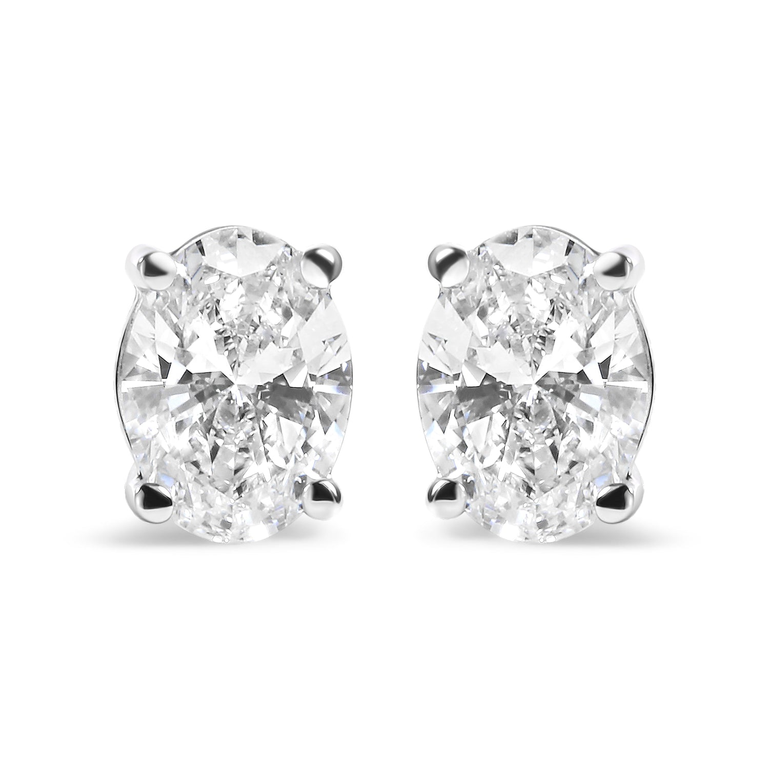 14K White Gold 3/4 Cttw Oval Shape Lab Grown Diamond Solitaire Stud Earrings (F-G Color, VS1-VS2 Clarity) by Bids.com