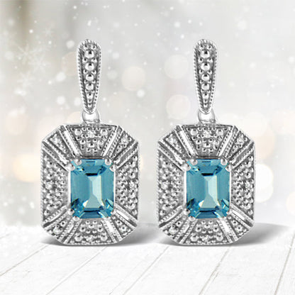 .925 Sterling Silver 7x5MM Emerald Shape Blue Topaz and Diamond Accent Art Deco Halo Style Drop and Dangle Earrings (I-J Color, I1-I2 Clarity) by Bids.com
