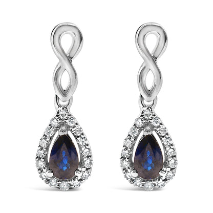 10K White Gold Pear Cut Blue Sapphire and 1/7 Cttw Diamond Infinity Drop and Dangle Earrings (I-J Color, I1-I2 Clarity) by Bids.com