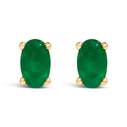 14K White Gold 5x3 MM Oval Green Emerald Solitaire Stud Earrings by Bids.com