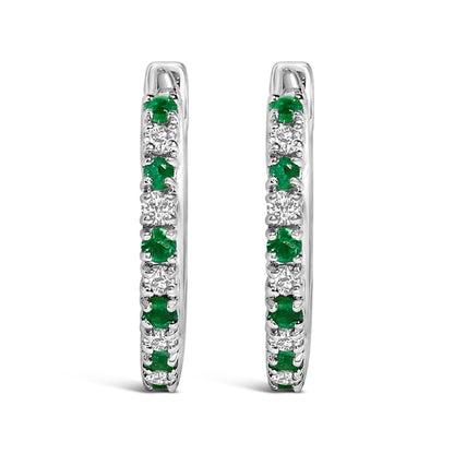 10K White Gold Alternating Emerald 1/10 Cttw Diamond Huggy Hoop Earrings (I-J Color, I1-I2 Clarity) by Bids.com
