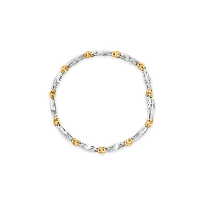 10k Two-Toned Gold 2.00 Cttw Channel Set Baguette-Diamond Weave and "X" Spiral Link Bracelet (H-I Color, I1-I2 Clarity) - 7" by Bids.com