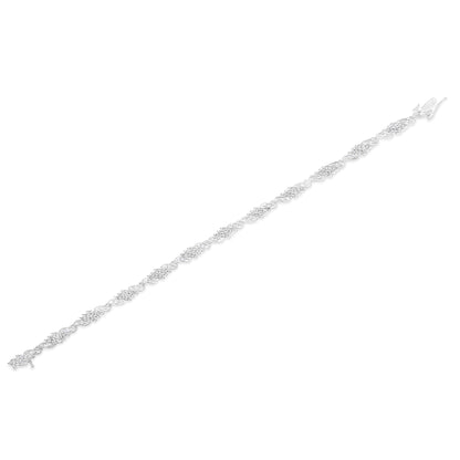 .925 Sterling Silver 1-1/2 Cttw Round and Baguette Cut Diamond Wave Link Bracelet (I-J Color, I2-I3 Clarity) - 7" by Bids.com