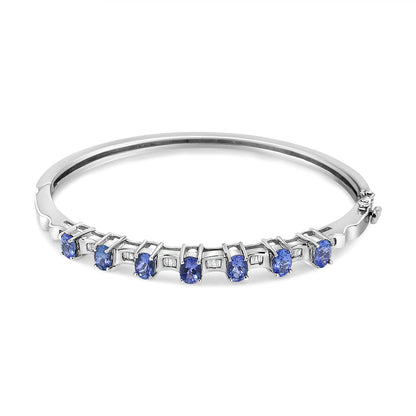 14K White Gold 5 MM Oval Blue Tanzanite and 1/4 Cttw Diamond Bangle (H-I Color, VS2-SI1 Clarity) - Fits wrists up to 7 1/2 Inches by Bids.com