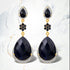 30.04 Carat Dyed Sapphire, Blue Sapphire and White Topaz .925 Sterling Silver Earrings by Bids.com