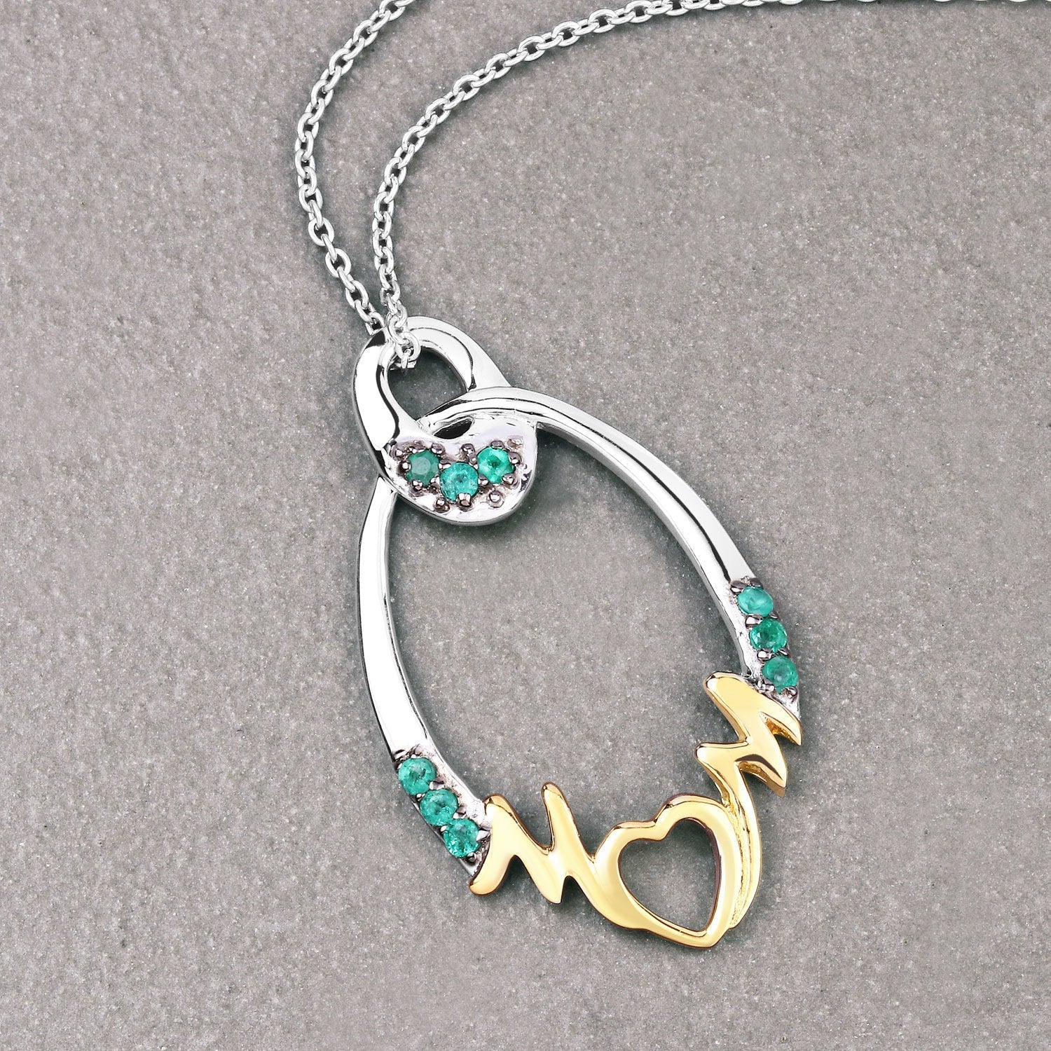 0.15 Carat Genuine Emerald .925 Sterling Silver Pendant by Bids.com