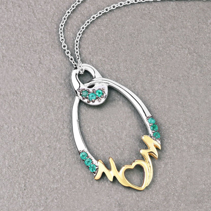 0.15 Carat Genuine Emerald .925 Sterling Silver Pendant by Bids.com