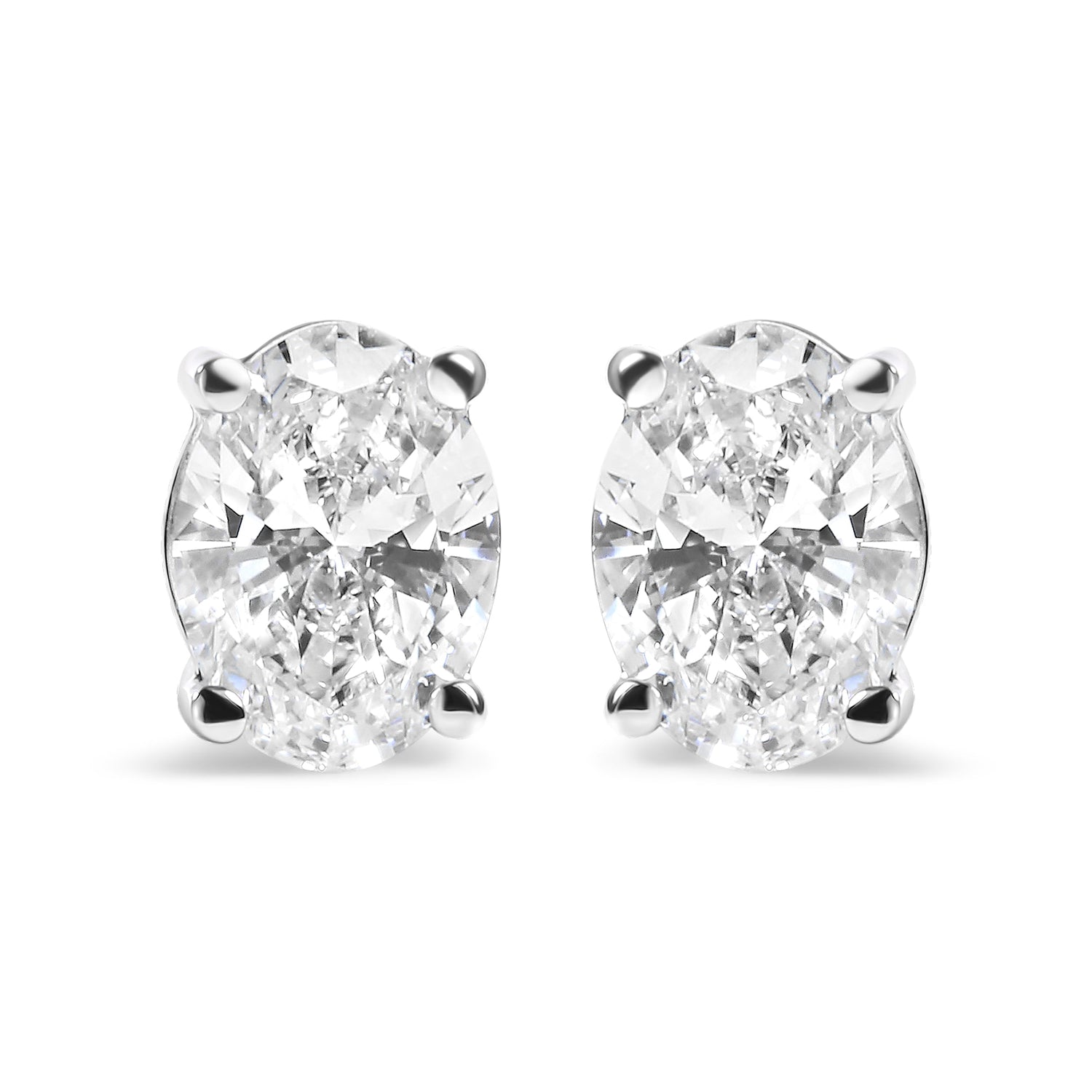 14K White Gold 3/4 Cttw Oval Shape Lab Grown Diamond Solitaire Stud Earrings (F-G Color, VS1-VS2 Clarity) by Bids.com
