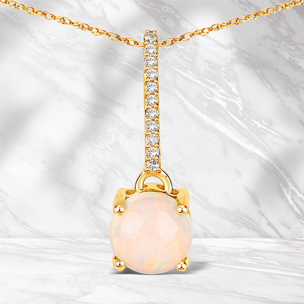 0.53 Carat Genuine Ethiopian Opal and White Diamond 10K Yellow Gold Pendant  DestGlow