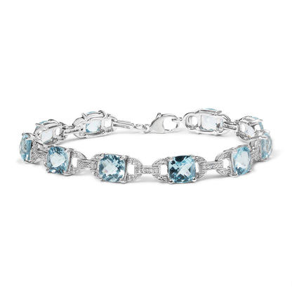 .925 Sterling Silver 7x7 mm Cushion Cut Blue Topaz and 1/20 cttw Round Cut Diamond Fashion Tennis Bracelet (I-J Color, I1-I2 Clarity) - 7" by Bids.com