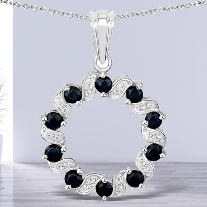 1.30 Carat Genuine Blue Sapphire and White Topaz .925 Sterling Silver Pendant by Bids.com