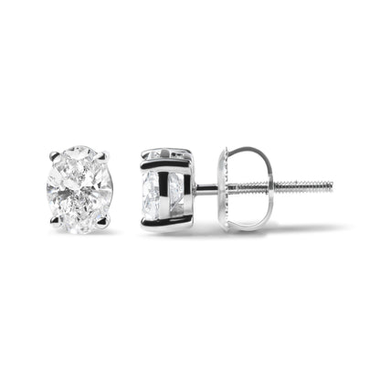 14K White Gold 3/4 Cttw Oval Shape Lab Grown Diamond Solitaire Stud Earrings (F-G Color, VS1-VS2 Clarity) by Bids.com