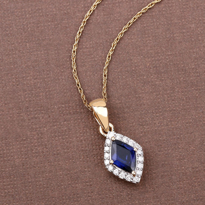 0.92 Carat Genuine Blue Sapphire and White Diamond 14K Yellow Gold Pendant by Bids.com