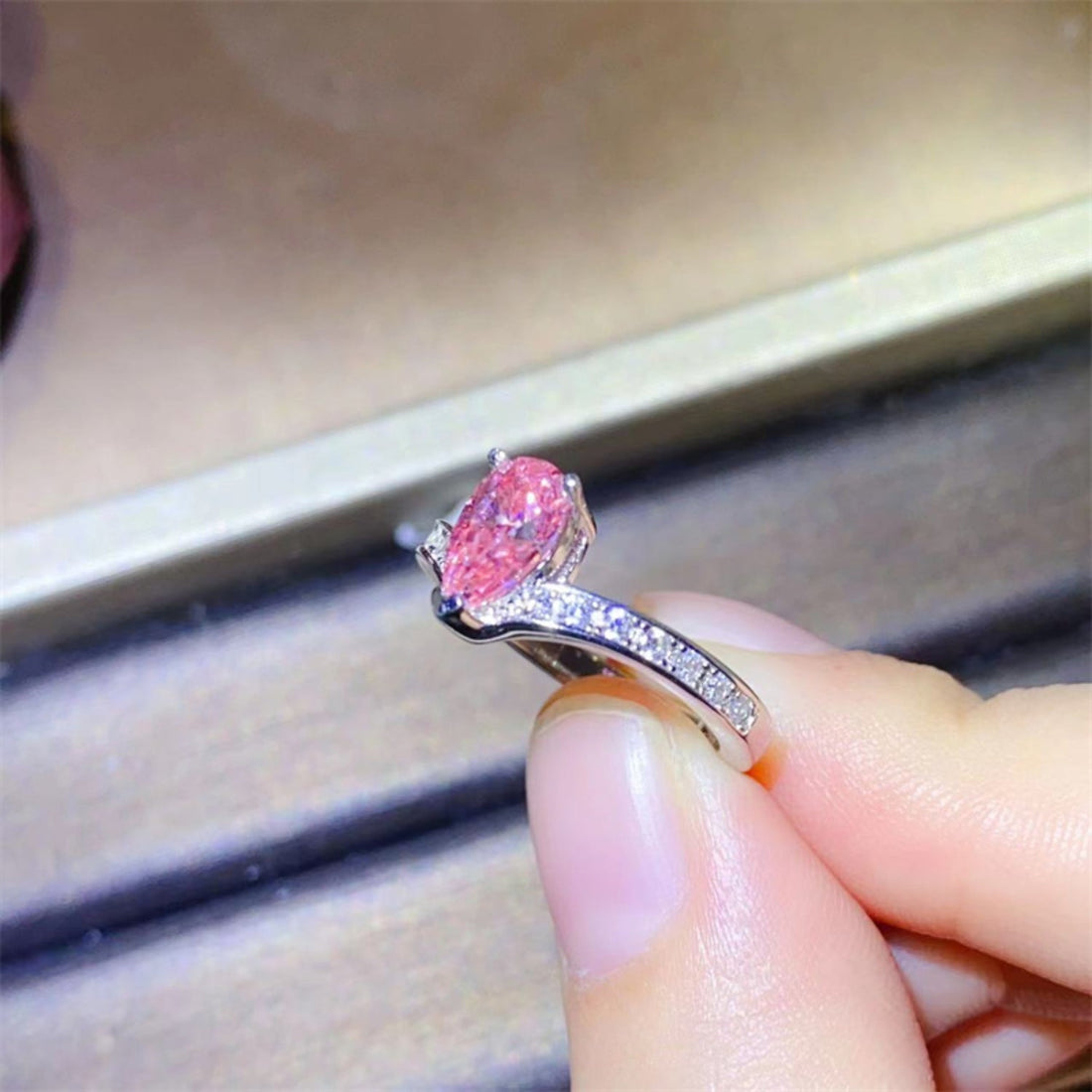 1 Carat Pear-Cut Pink Sparkala™ Platinum Over Pure Sterling Silver Ring - DestGlow