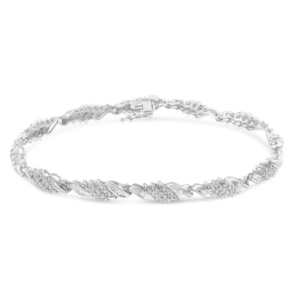 .925 Sterling Silver 1-1/2 Cttw Round and Baguette Cut Diamond Wave Link Bracelet (I-J Color, I2-I3 Clarity) - 7" by Bids.com