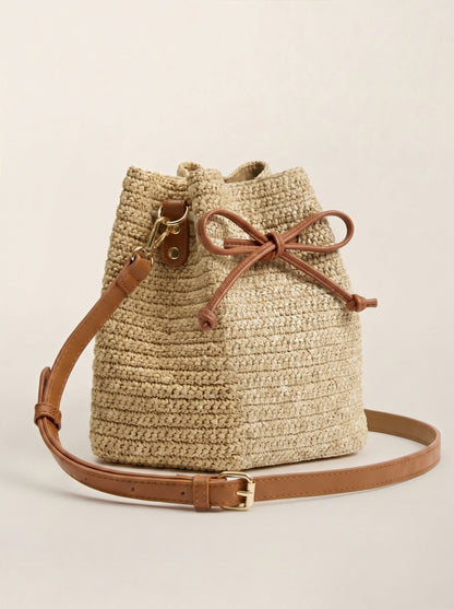 Mini Handwoven Raffia Drawstring Crossbody Bag by LINTICO