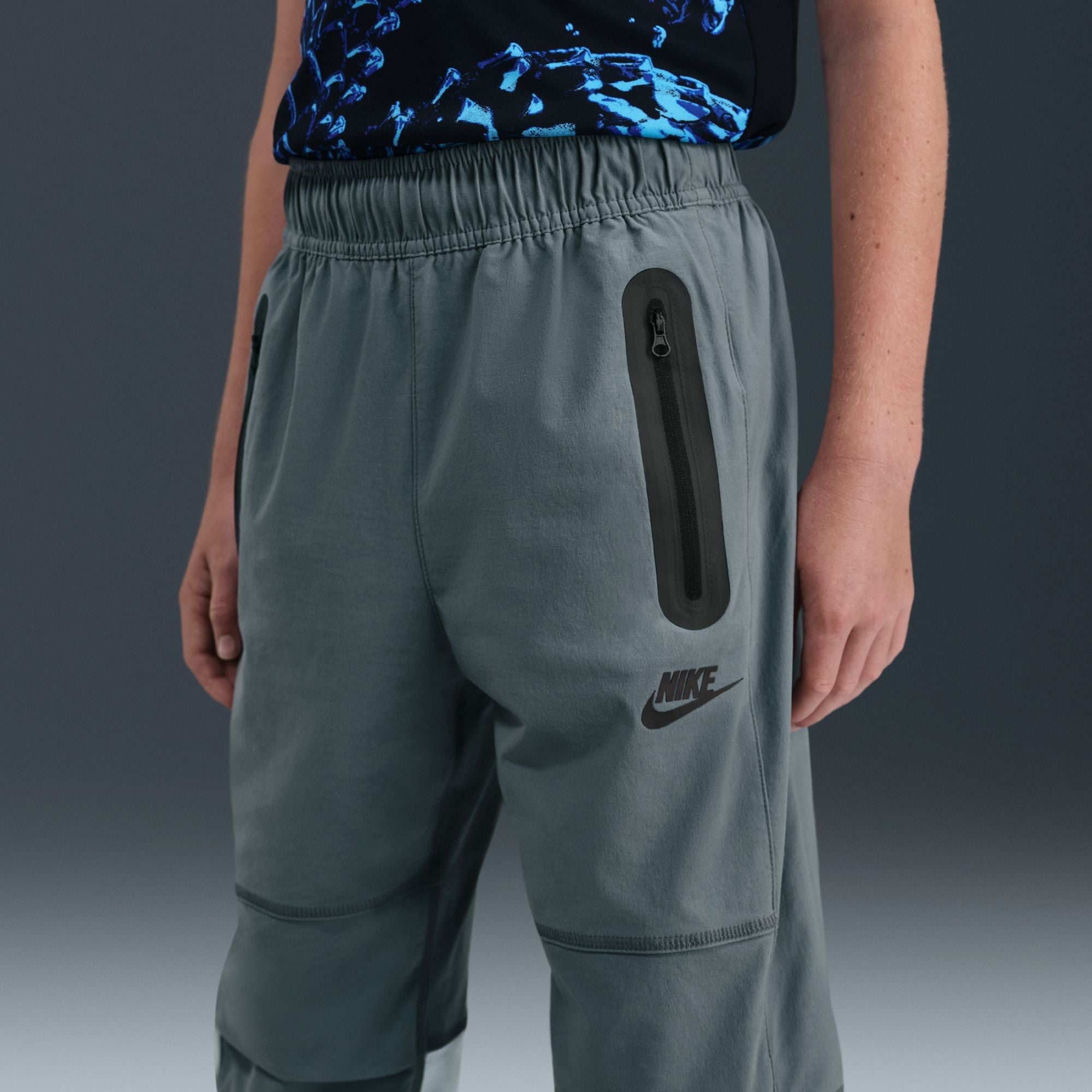 Nike Big Kids Tech Woven Pants - Smoke Grey by Denim Exchange