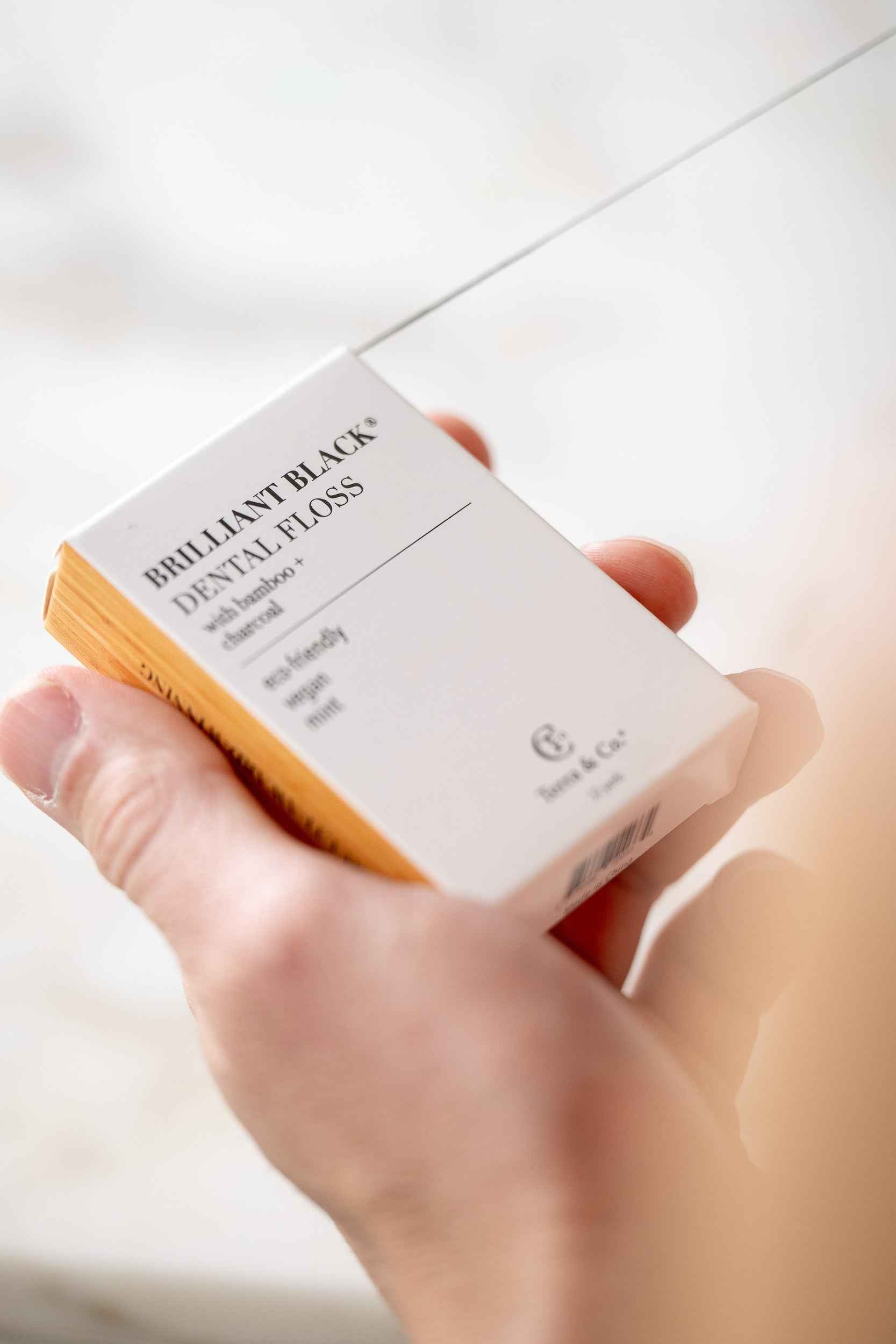 Brilliant Black® Floss – Whitens Between Teeth Naturally