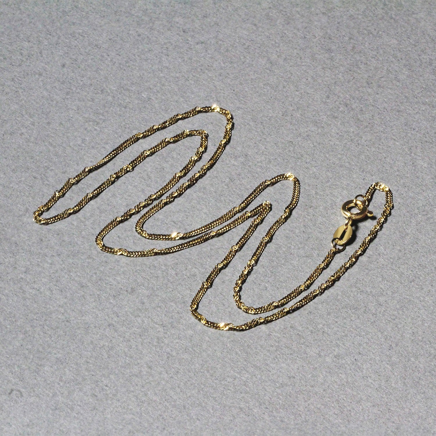 10k Yellow Gold Singapore Chain (1.50 mm) - DestGlow
