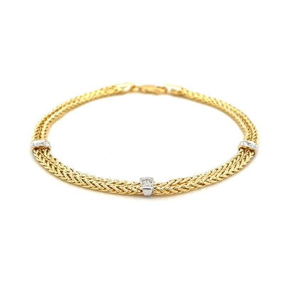 14k Two-Tone Gold Dual Wheat Chain Bracelet with Diamond Stations (.02 cttw) by Bids.com