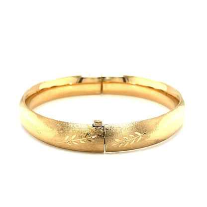 Classic Floral Carved Bangle in 14k Yellow Gold (10.0mm) by Bids.com