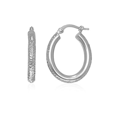 14k White Gold Diamond Cut Textured Oval Hoop Earrings. - earrings