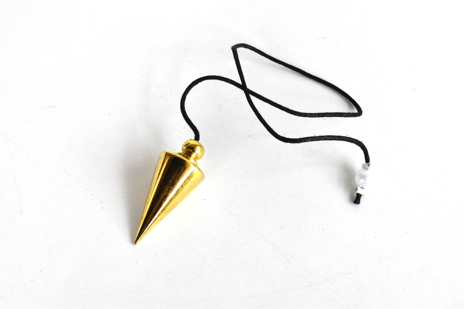Cone with Round Brass Pendulum Silver Metal Pendulums.  DestGlow