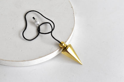 Cone with Round Brass Pendulum Silver Metal Pendulums.  DestGlow