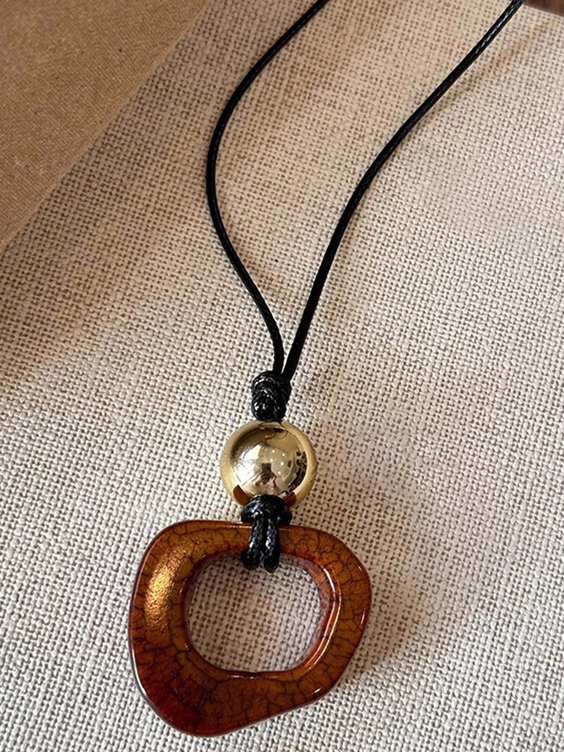 Long Sweater Necklace With Resin Camel Bone Pendant by LINTICO