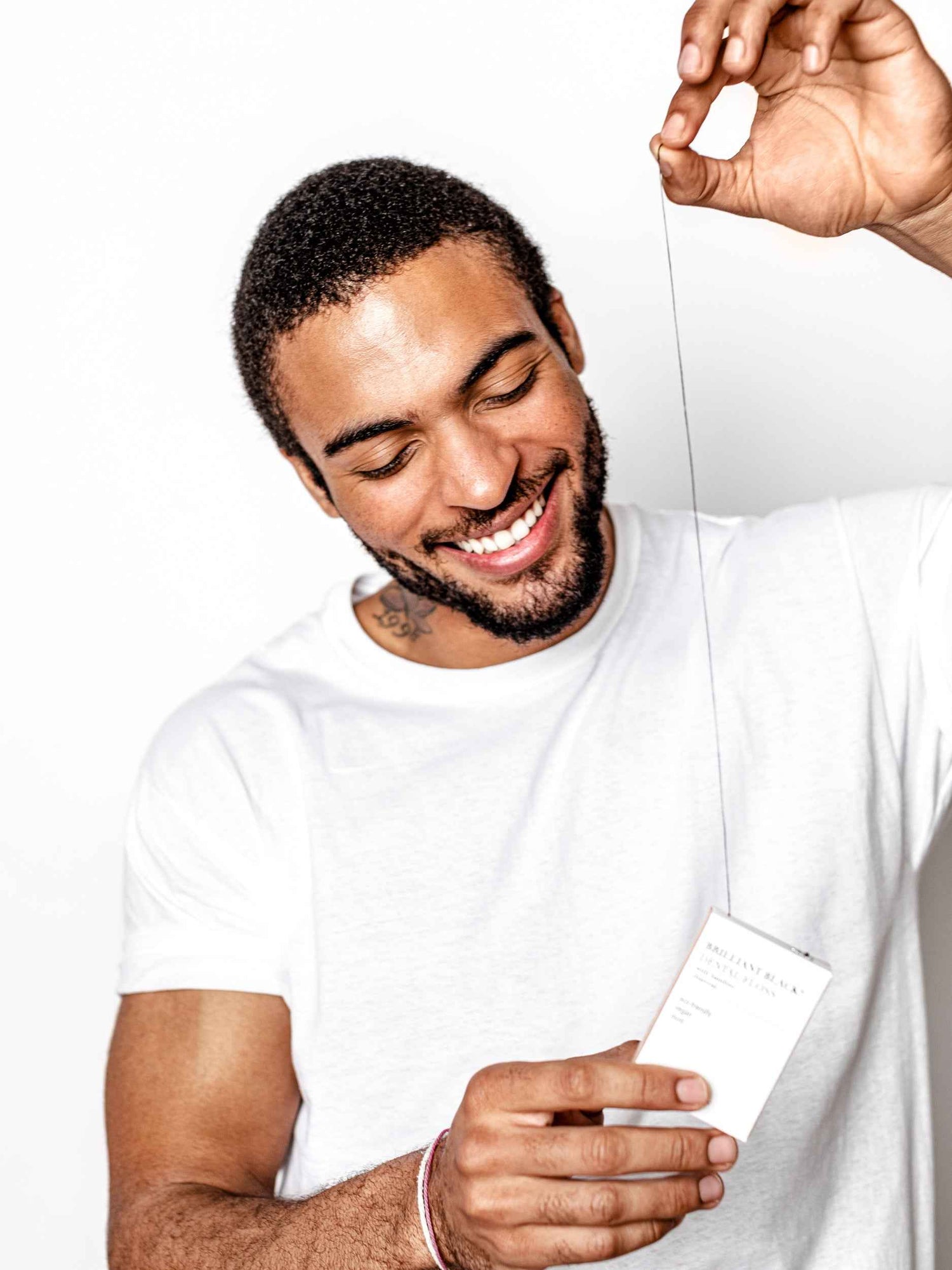 Brilliant Black® Floss – Whitens Between Teeth Naturally