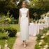 Autumn Arrival An Elegant Solid Color Sleeveless Dress With A Fitted Waist A Twisted Knot Detail At The Waist  DestGlow
